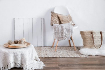 Bright interior of a cozy room with a chair and home decor.