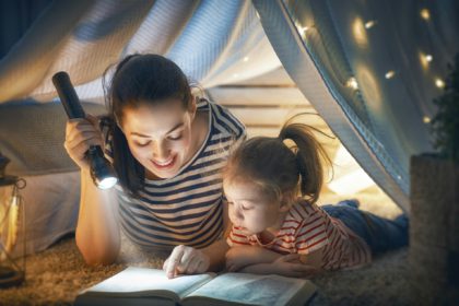 Mom and child reading book